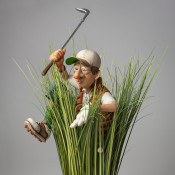 Golfista v křoví
